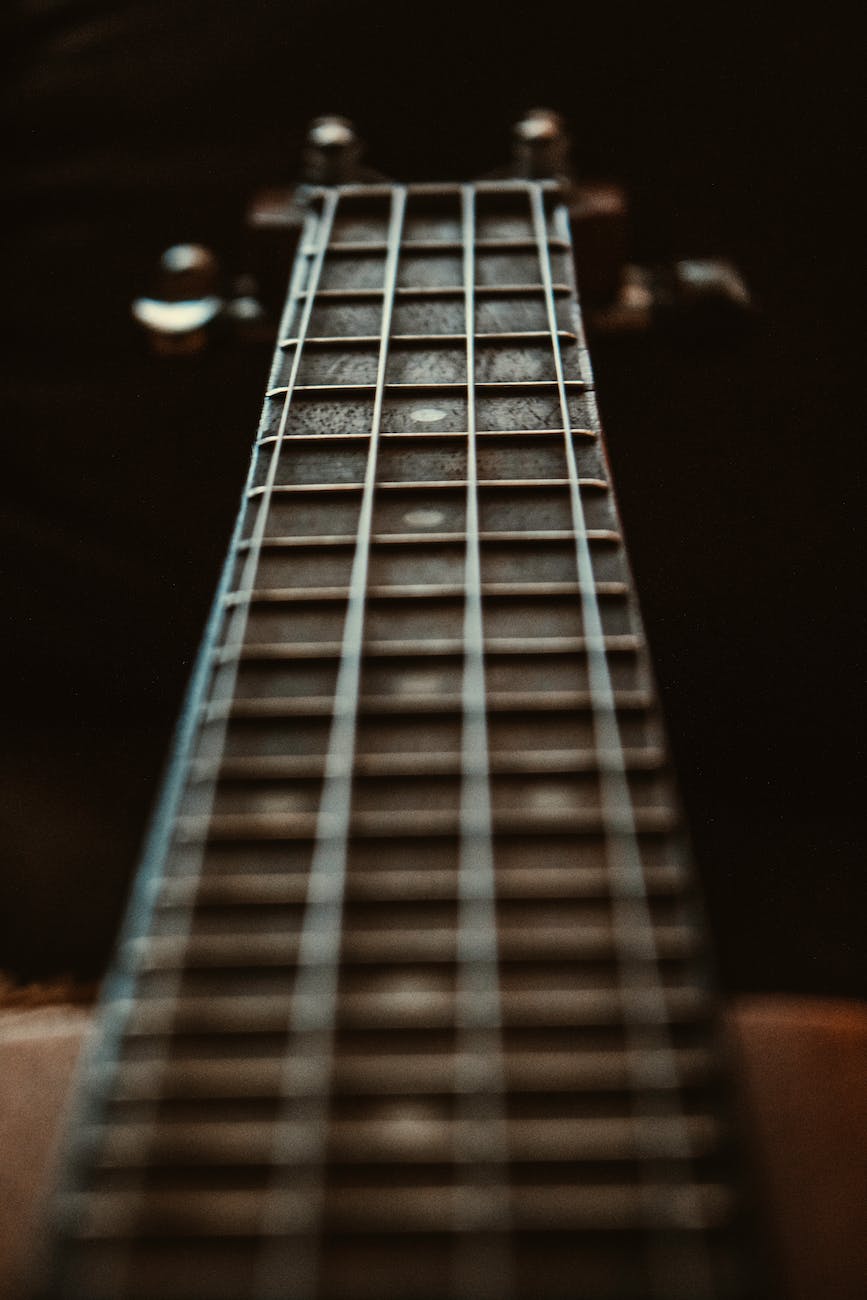 selective focus photo of fretboard