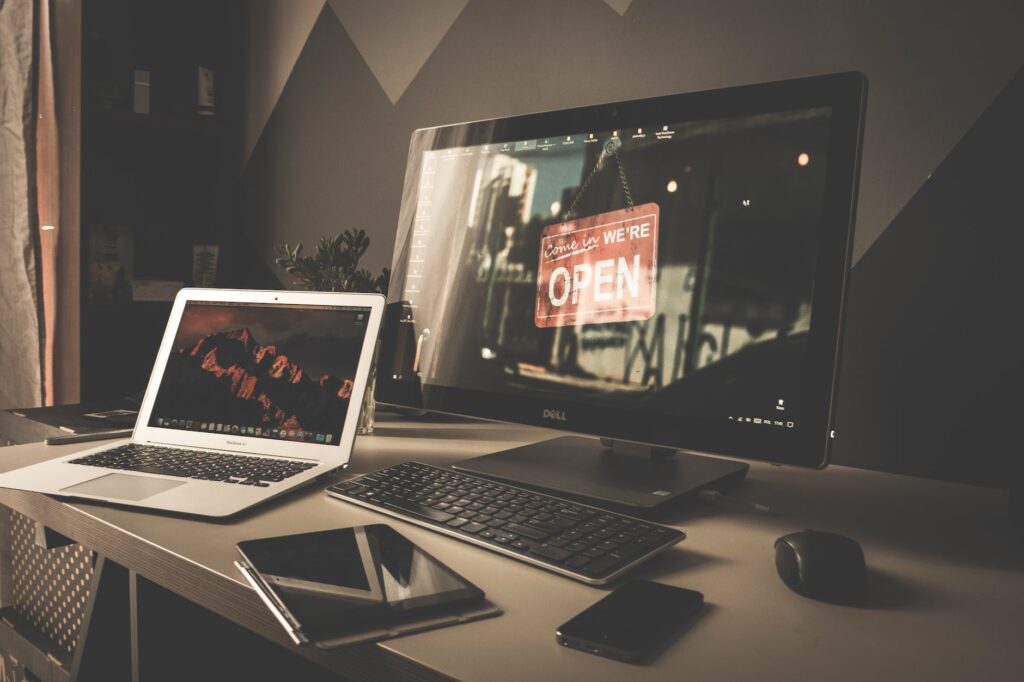 computer set up on a workspace